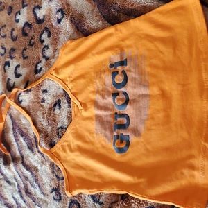 Non authentic gucci  tee orange size small